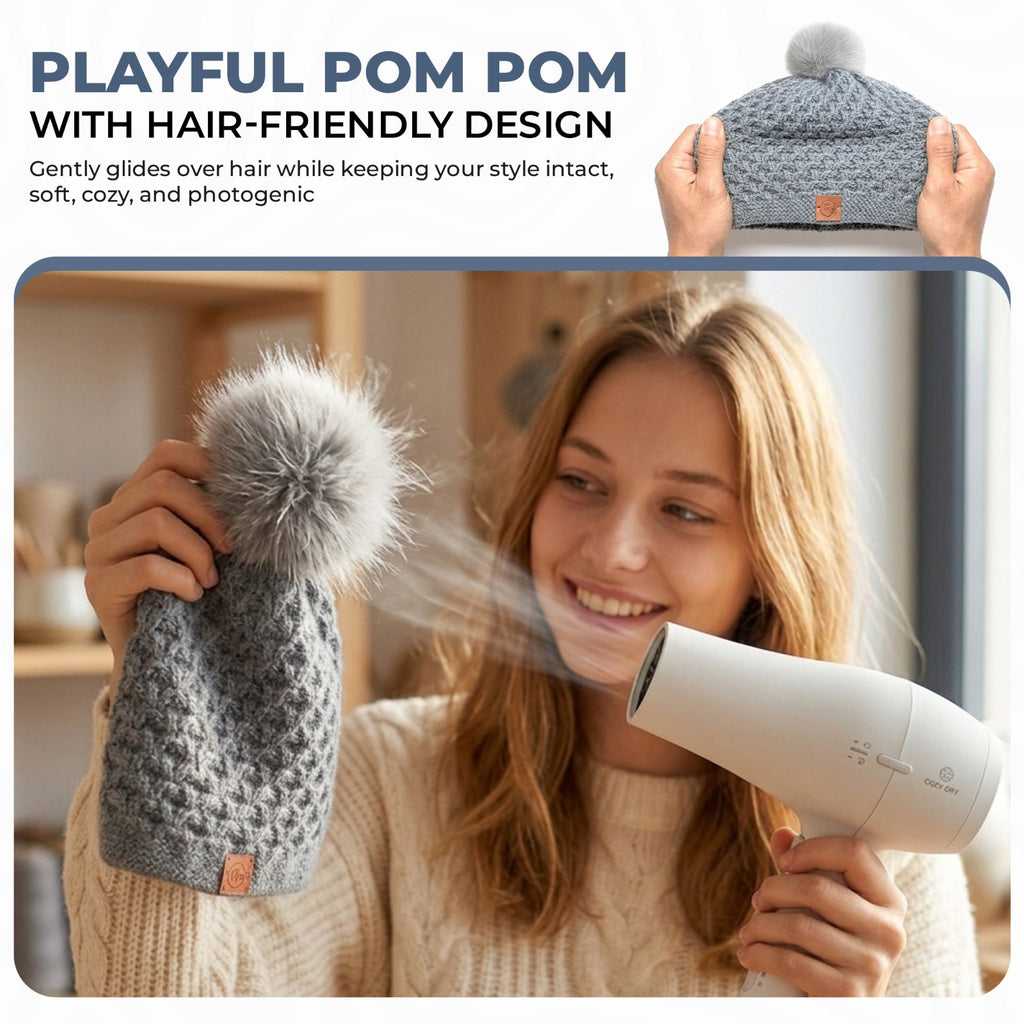Chem Taas grey beanie playful pom pom hair-friendly design
